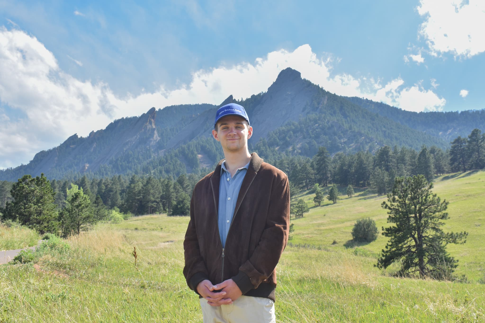 Jamo in front of the Flatirons